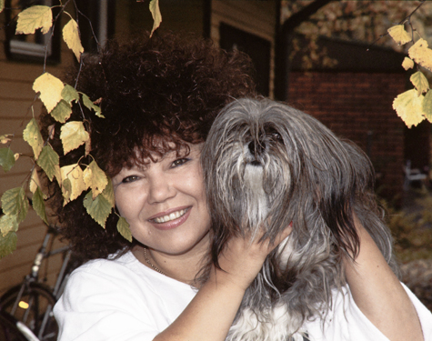 Schlager singer Anita Hirvonen with a dog.
