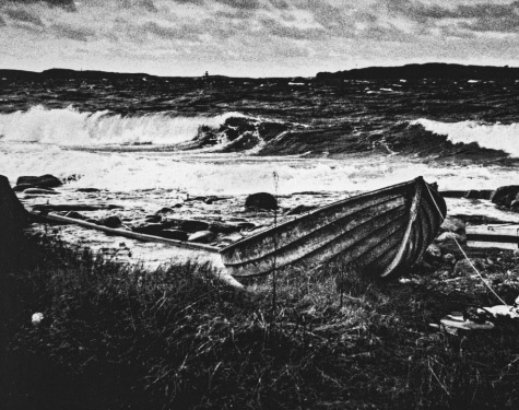 Stormy sea and rowing boat
